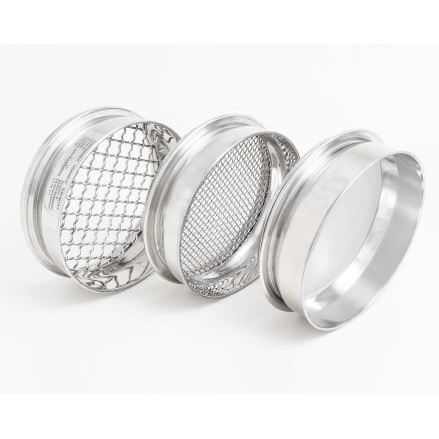 Geological sieves, showing three of the numerous woven wire mesh apertures available.