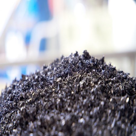 Pulverised mineral ore granules for assay testing.