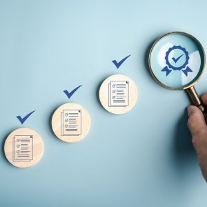 Certificate approval process with document checklist, magnifying focus quality assurance, verification system, compliance audit, and standard validation. for ISO